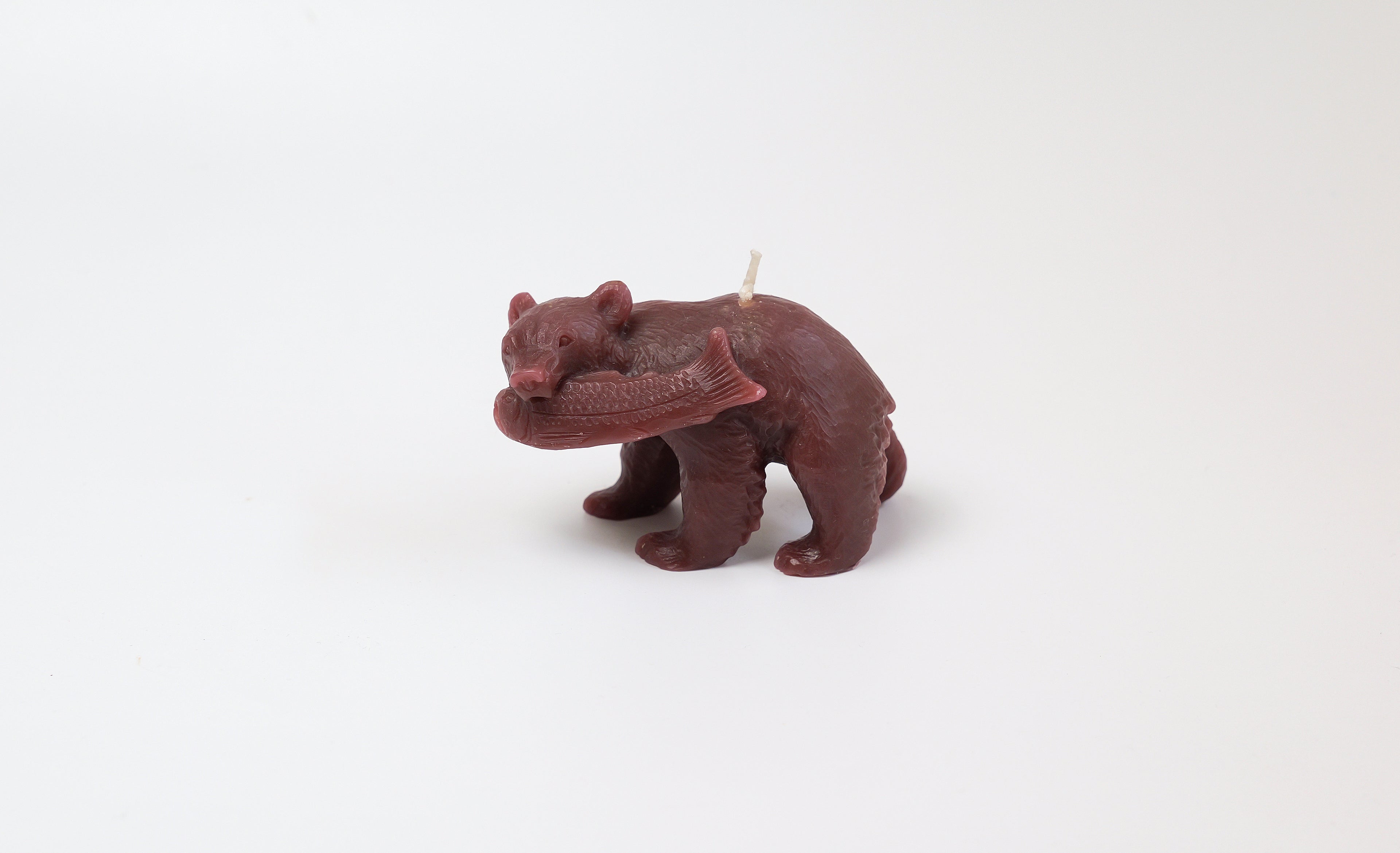 Carved wooden bear candle