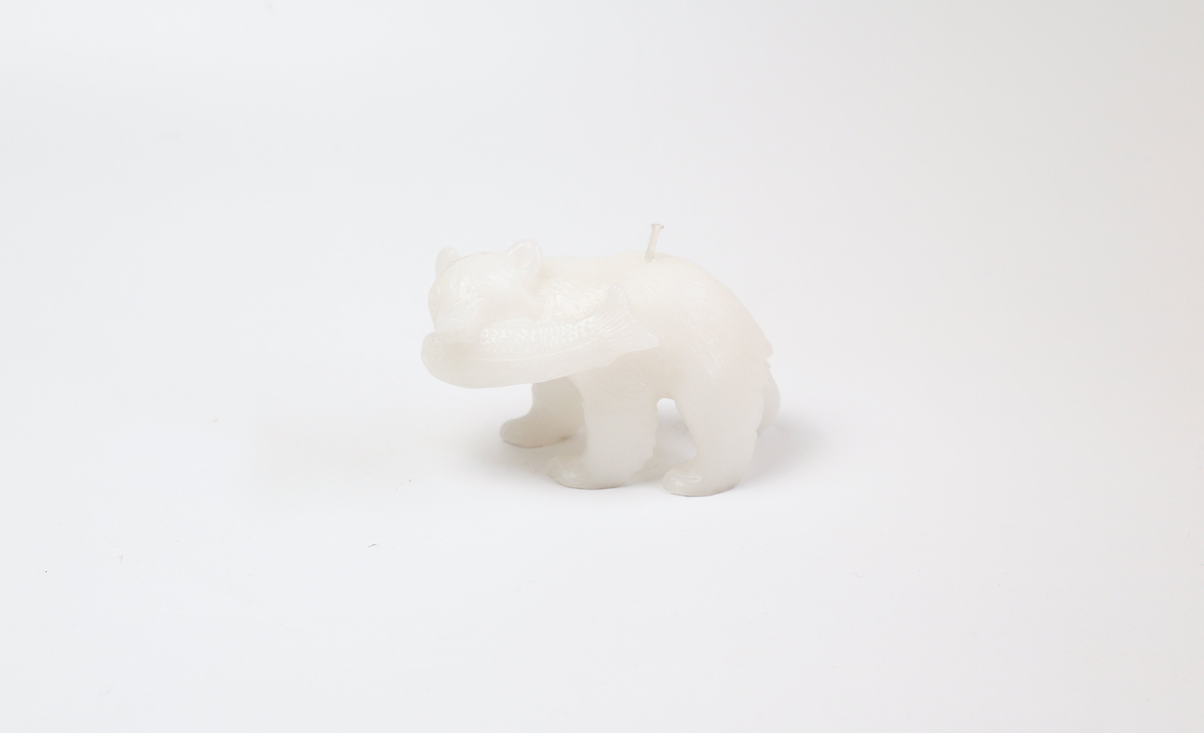 Carved wooden bear candle