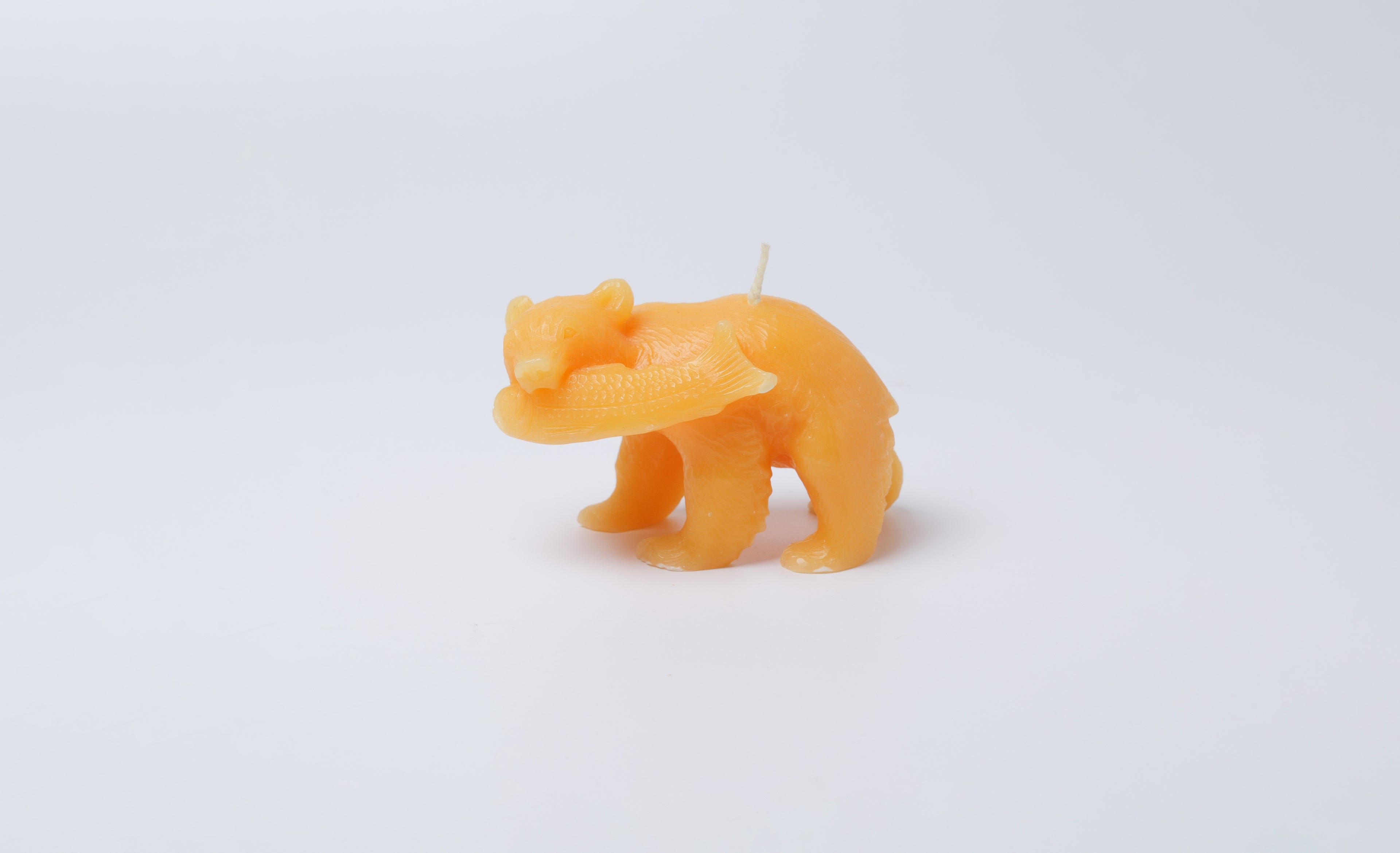Carved wooden bear candle
