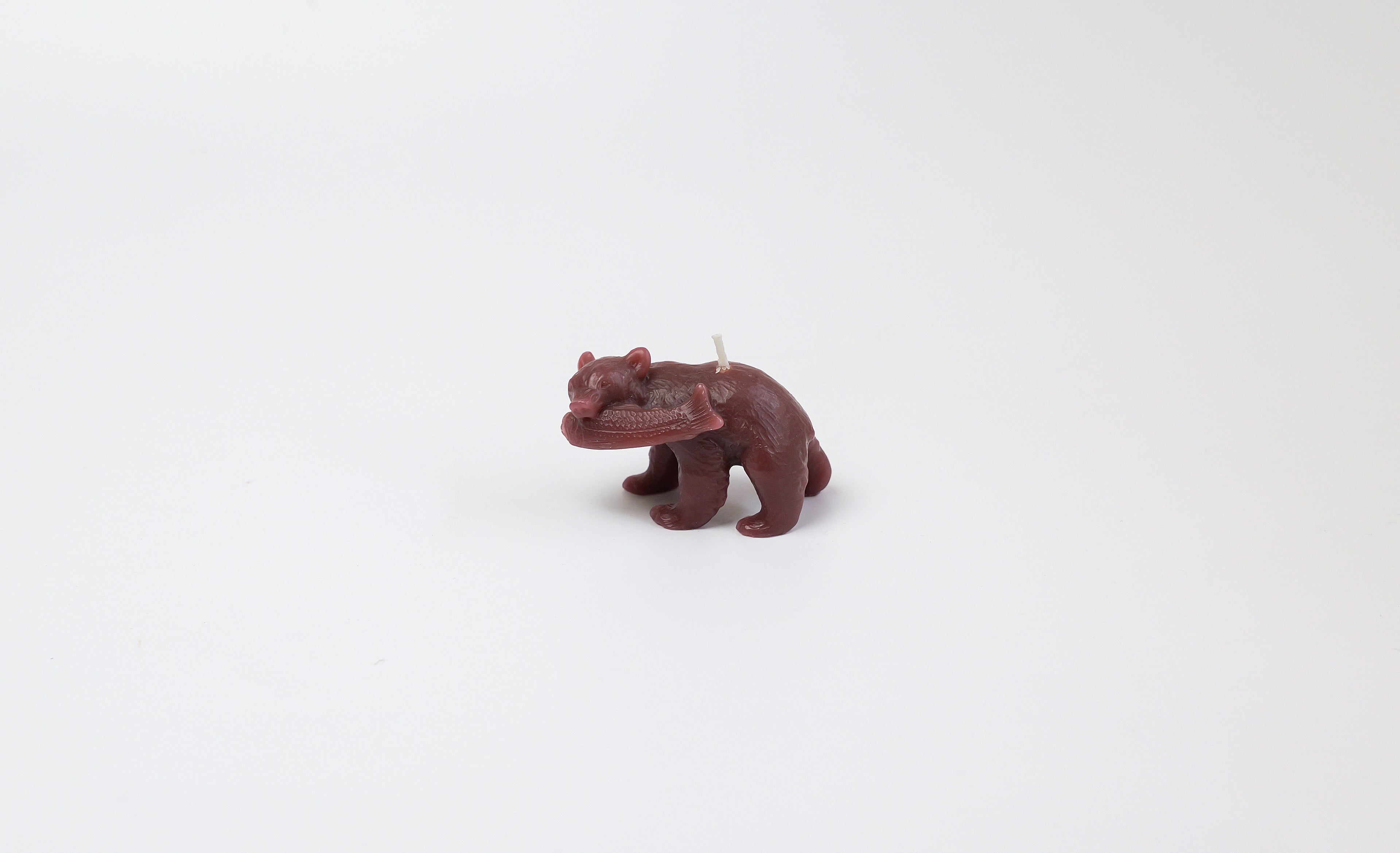 Carved wooden bear candle