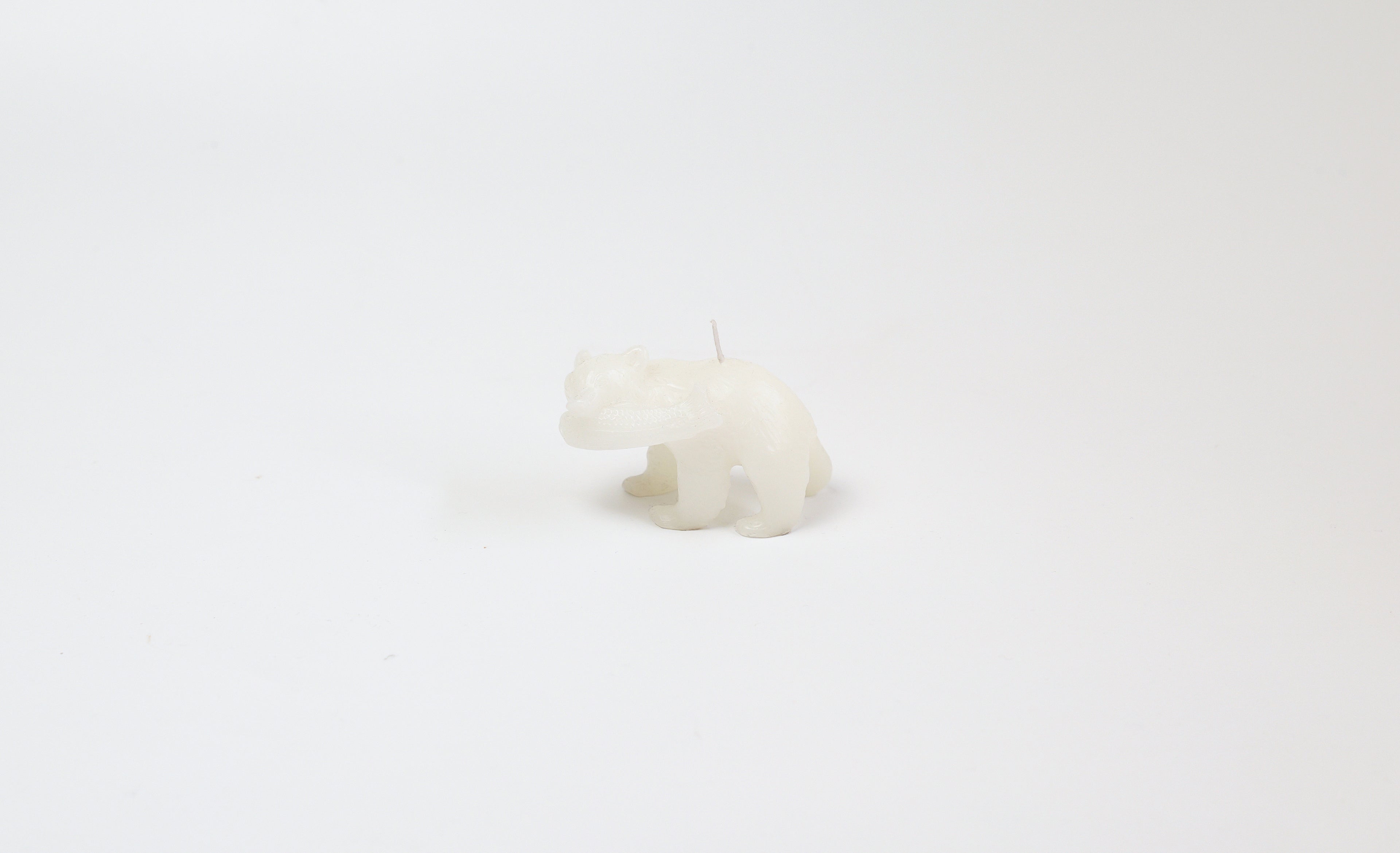 Carved wooden bear candle